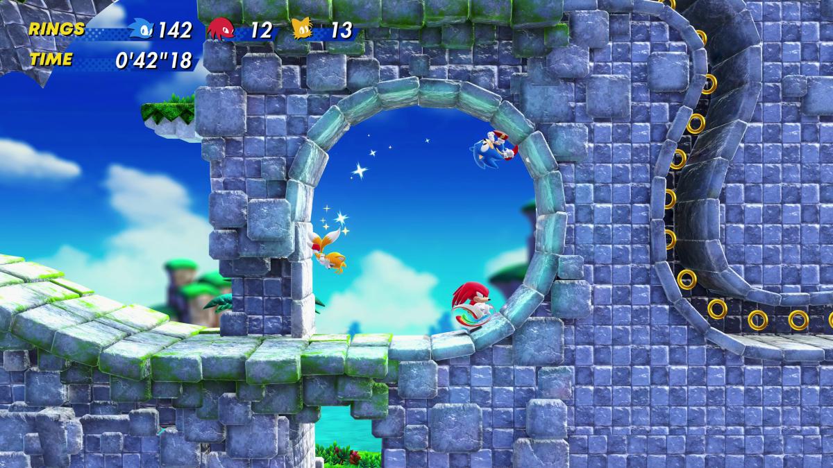 Sonic Superstars Sonic Knuckles and Tails doing a loop